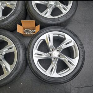 6th Gen Camaro tires and wheels complete with center caps, lug nuts and TPMS sensors like brand new