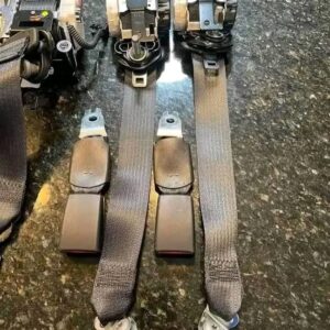Full set of black seat belts front and rear.